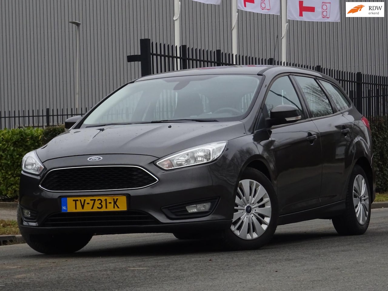 Ford Focus Wagon - 1.0 Titanium Edition NAVI/AC/CRUISE/PDC - AutoWereld.nl