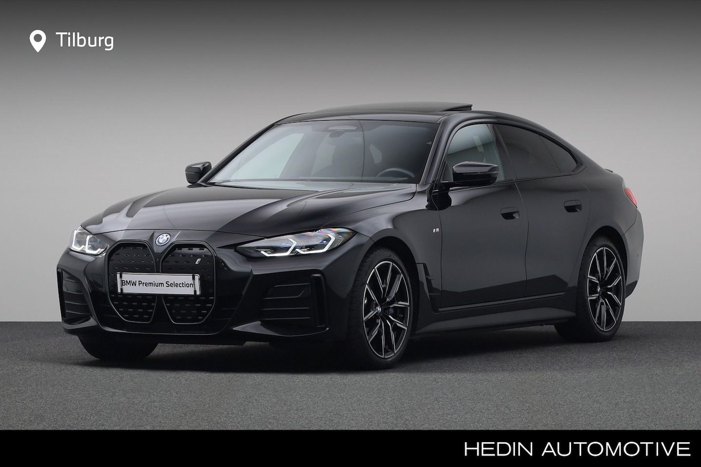 BMW i4 - eDrive40 High Executive 84 kWh | Driving Assistant Professional | Elektrisch bediend glaze - AutoWereld.nl