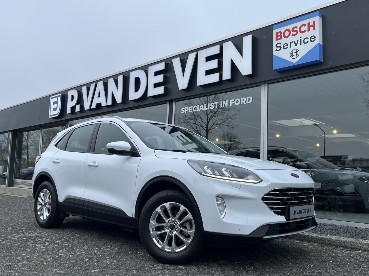 Ford Kuga - 2.5 PHEV Titanium 225pk/165kW e-CVT Automaat | 28763 | Koplampsproeiers | Winter Pack | - AutoWereld.nl