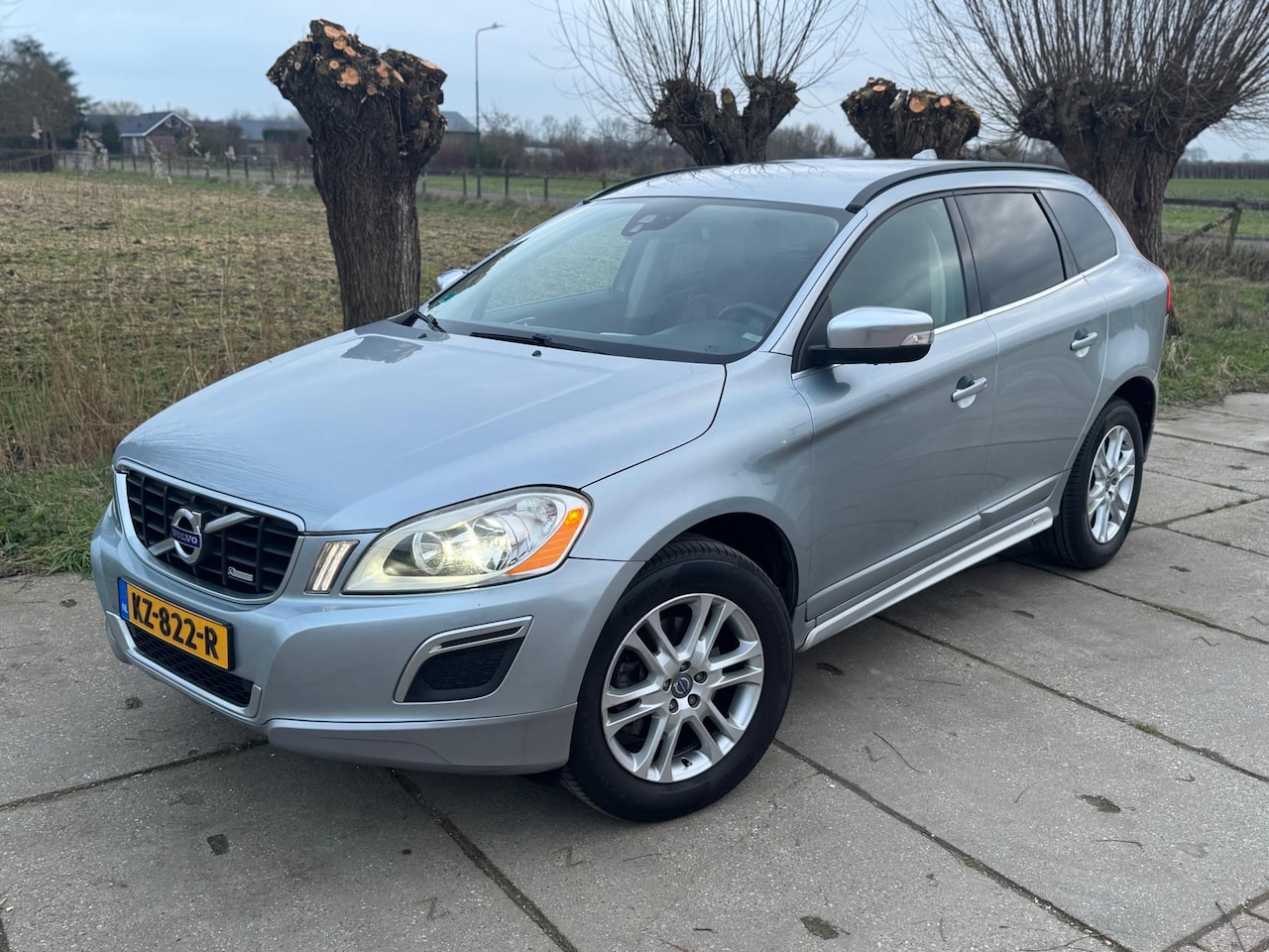 Volvo XC60 - 2.4D AWD R-Design EURO5 AUTOMAAT/LEDER/CLIMA/CRUISE/PDC/TREKHAAK - AutoWereld.nl