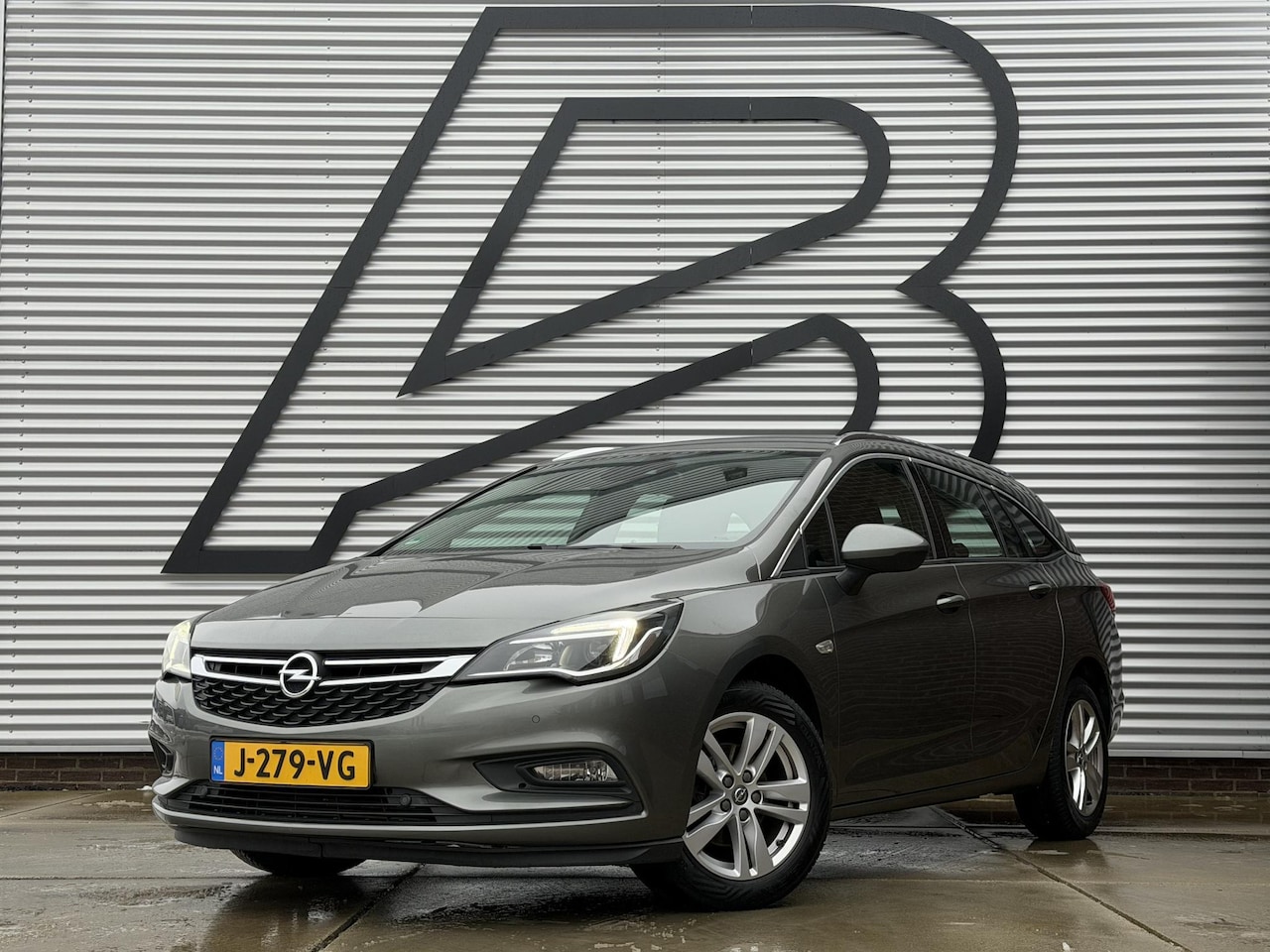 Opel Astra Sports Tourer - 1.4 Innovation 2e Eigenaar,Navi,Clima,Cruise,PDC V+A,6-bak,APK tot 09-2026 - AutoWereld.nl