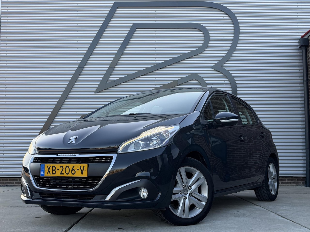 Peugeot 208 - 1.2 PureTech Signature Navi,Airco,Cruise,PDC,N.A.P,Dealer Onderhouden,APK tot 04-2026 - AutoWereld.nl
