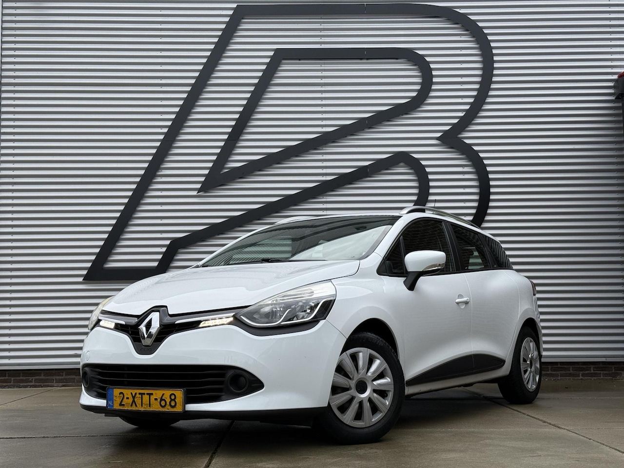 Renault Clio Estate - 0.9 TCe Expression Navi,Airco,Cruise,Bluetooth,N.A.P,APK tot 11-2026 - AutoWereld.nl