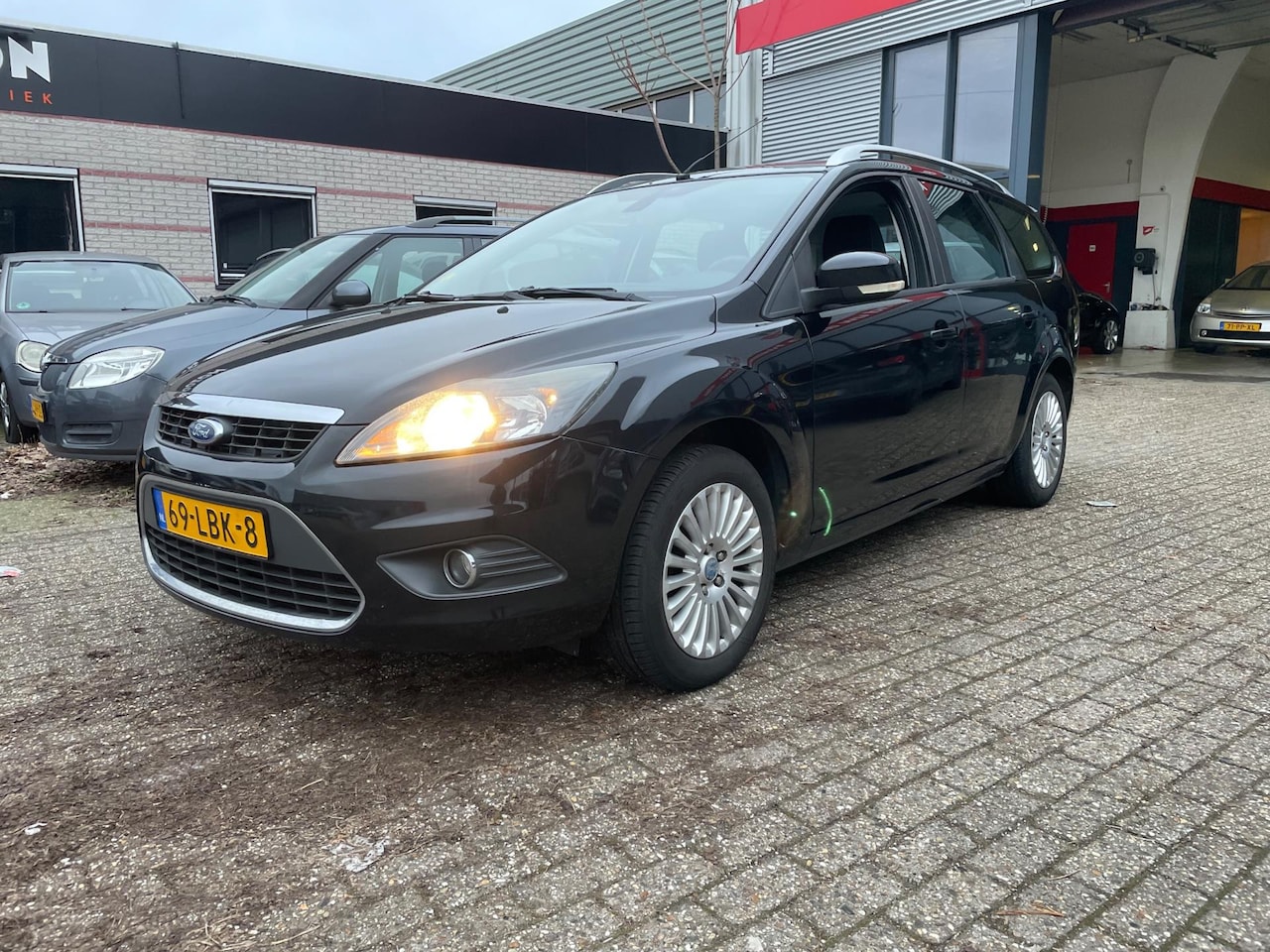 Ford Focus Wagon - 1.8 Limited Flexi Fuel navi keyles zeer nette auto - AutoWereld.nl