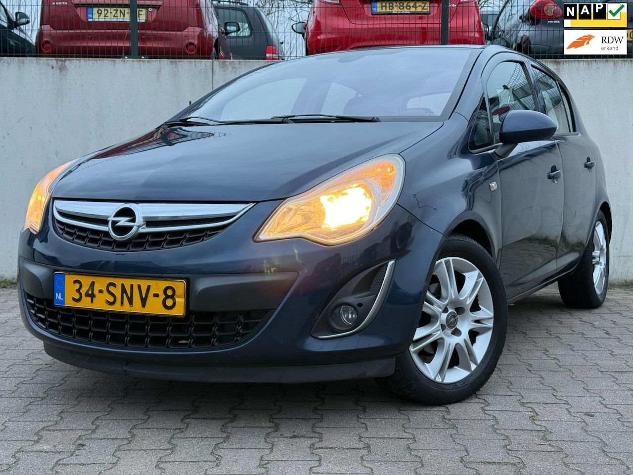 Opel Corsa - 1.4-16V Cosmo/HALF LEDER/AIRCO/PDC/CRUISE/124919 KM NAP/ - AutoWereld.nl