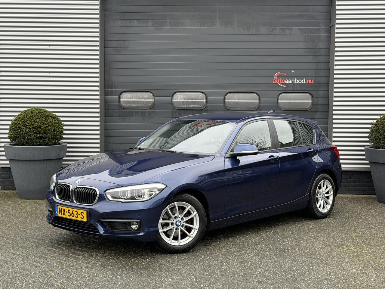 BMW 1-serie - 118i Corporate Lease Executive | Navigatie | Climate Control | Lichtmetalen Velgen | 5 Deu - AutoWereld.nl