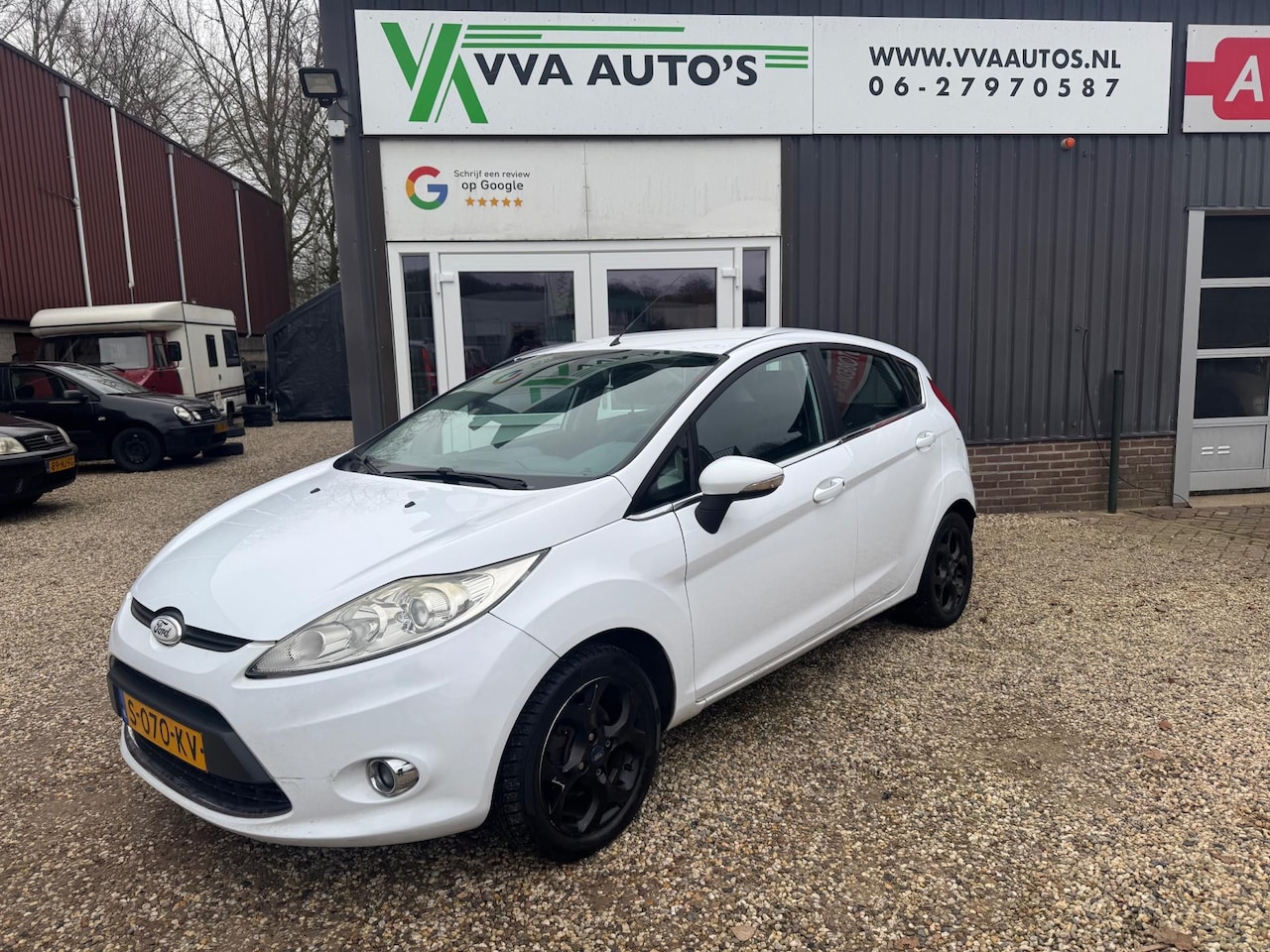 Ford Fiesta - 1.25 Titanium clima,stoel- en voorruitverw, lm velgen, leuke auto! - AutoWereld.nl