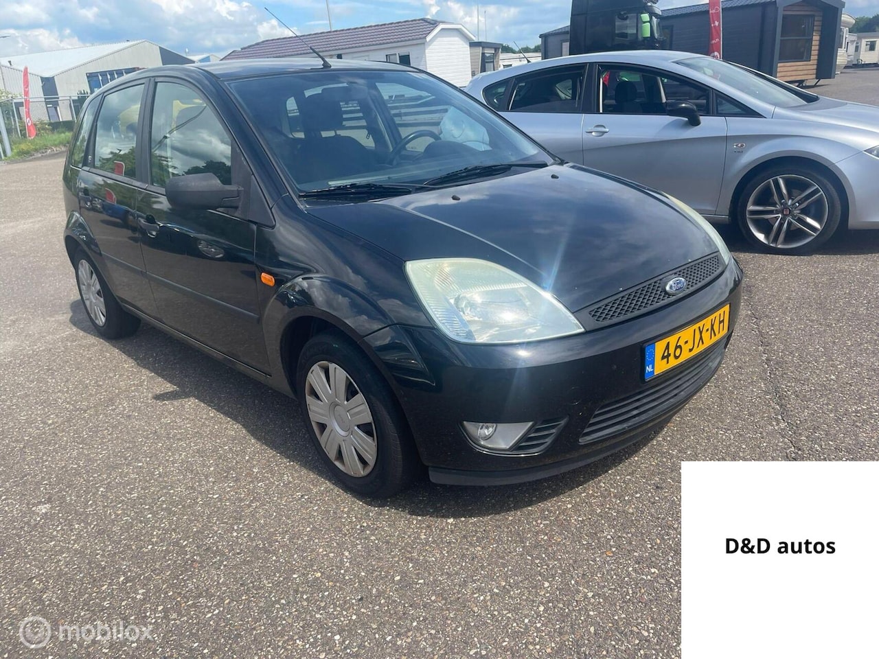 Ford Fiesta - 1.4-16V Ghia 1.4-16V Ghia - AutoWereld.nl