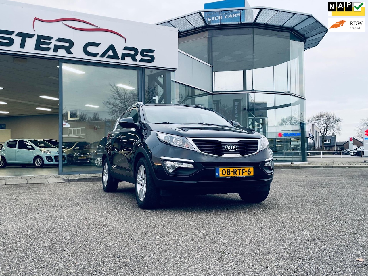 Kia Sportage - 1.6 GDI X-ecutive Plus Pack 1.6 GDI X-ecutive Plus Pack, Trekhaak, Half Leer, NAP, Airco, APK - AutoWereld.nl