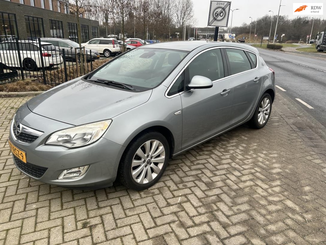 Opel Astra - 1.4 Turbo Cosmo 2011! NAVIGATIE! Nette Auto! - AutoWereld.nl