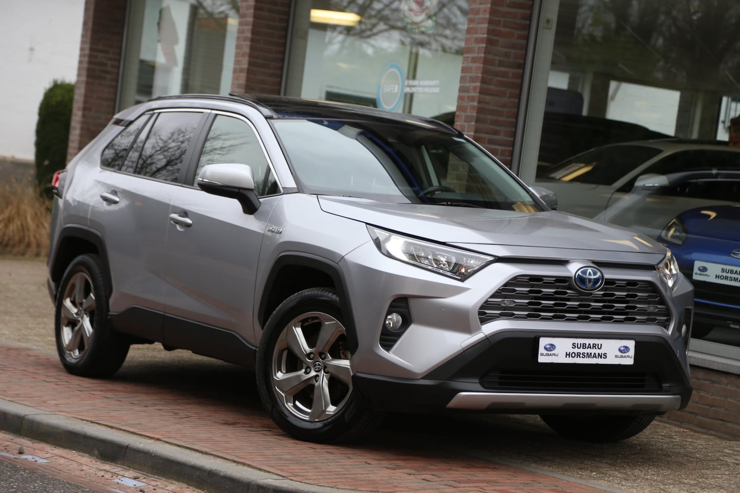 Toyota RAV4 - 2.5 Hybrid Dynamic Schuifdak Navi Camera ACC - AutoWereld.nl