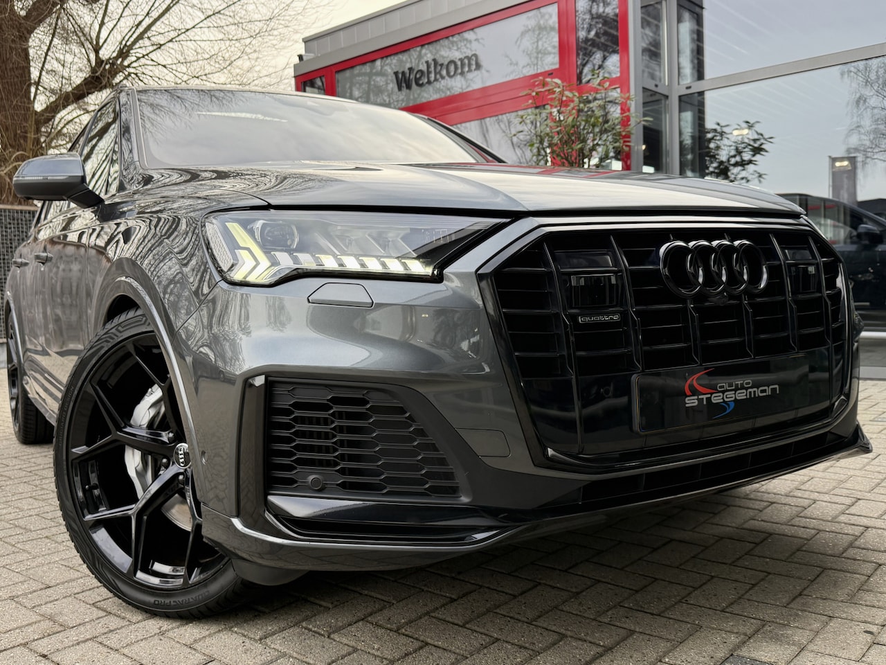 Audi Q7 - 55 TFSI-e QUATTRO *!* S-LINE *!* PANODAK/ RADAR/ 22 INCH/ 360 CAM/ LUCHTVERING *!* - AutoWereld.nl
