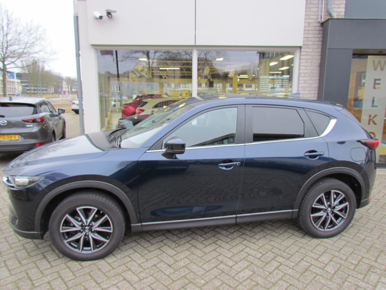 Mazda CX-5 - 2.0 Skyaciv-G 165pk 6AT 2WD Comfort met BOSE Leer Trekhaak - AutoWereld.nl