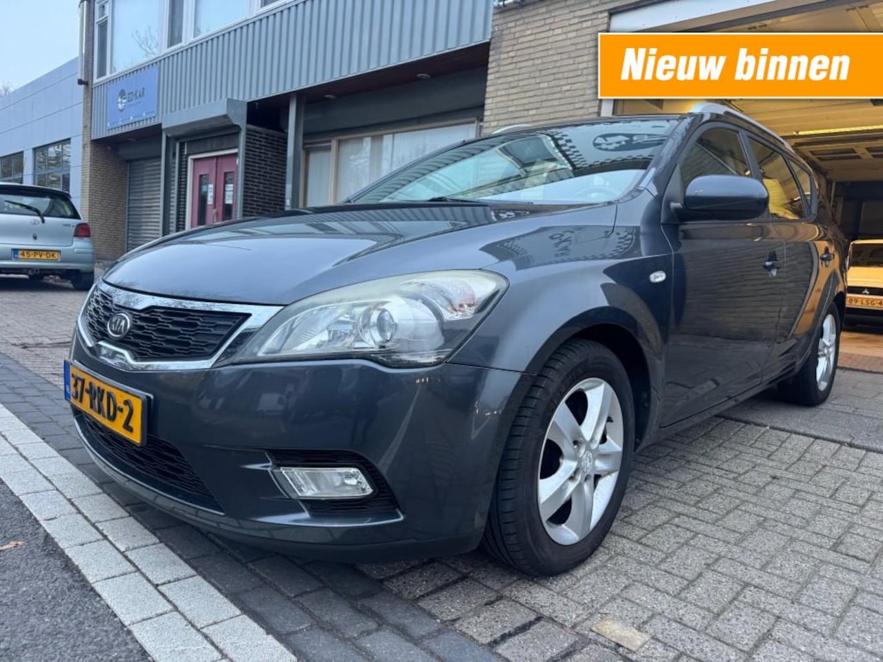 Kia Cee'd - 1.4 CVVT Seven AIRCO NAVI CAMERA TREKHAAK NAP APK GOEDONDERHOUDEN - AutoWereld.nl
