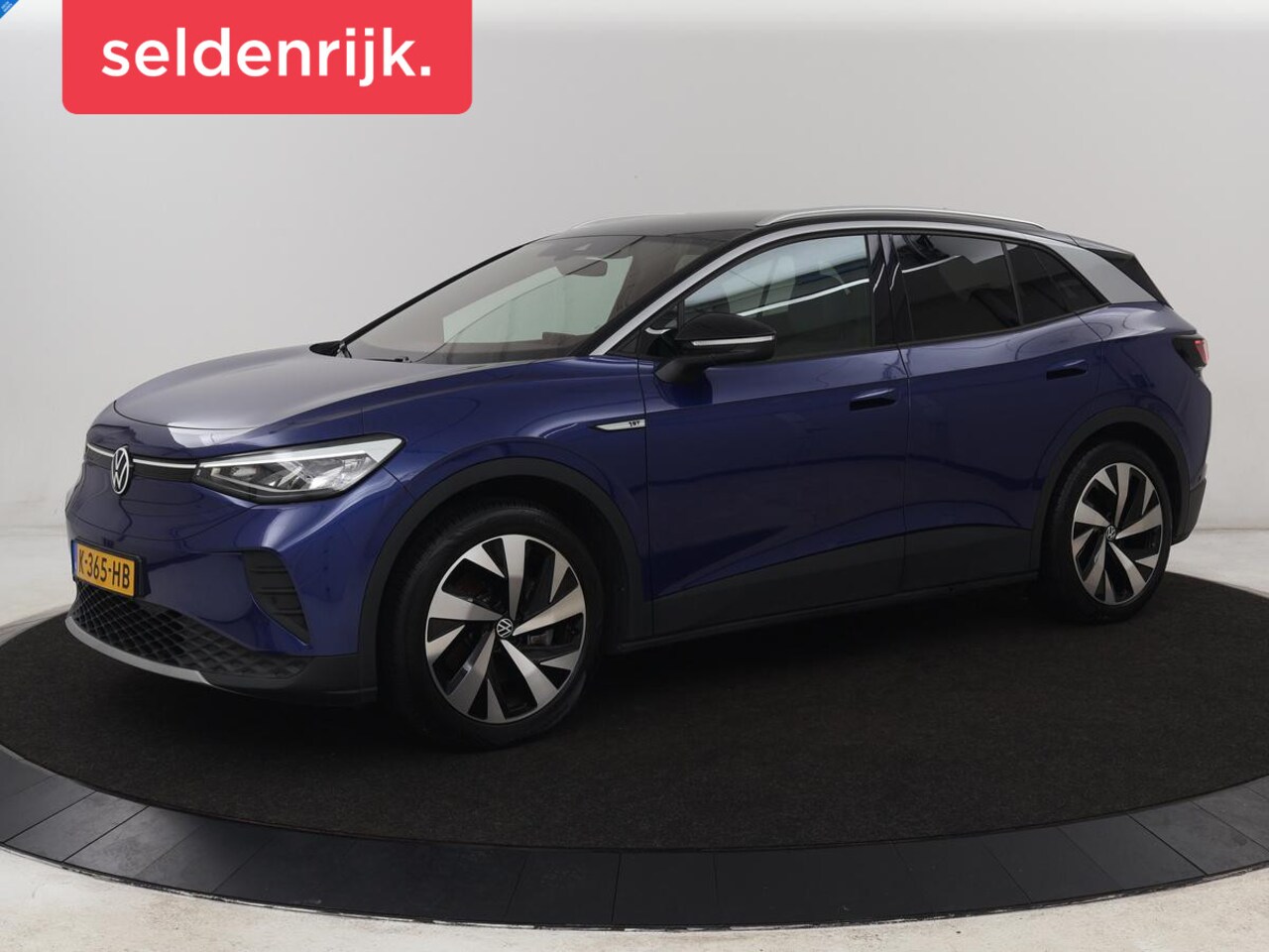 Volkswagen ID.4 - First 77 kWh | Trekhaak | Stoel & stuurverwarming | Adaptive cruise | Camera | Carplay | H - AutoWereld.nl