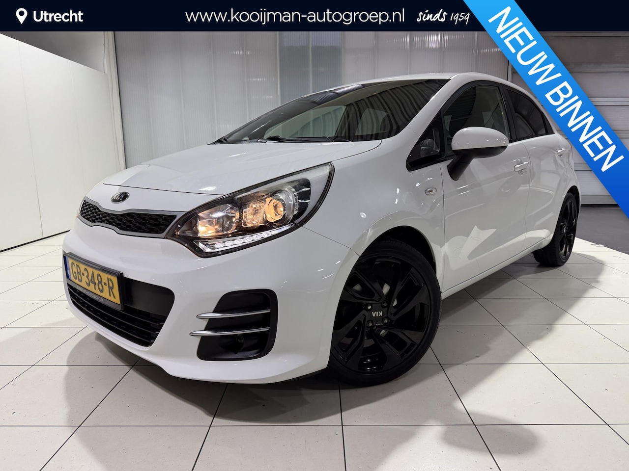 Kia Rio - 1.2 CVVT DynamicLine Navigatie, Camera, Airco, Zwarte velgen. - AutoWereld.nl