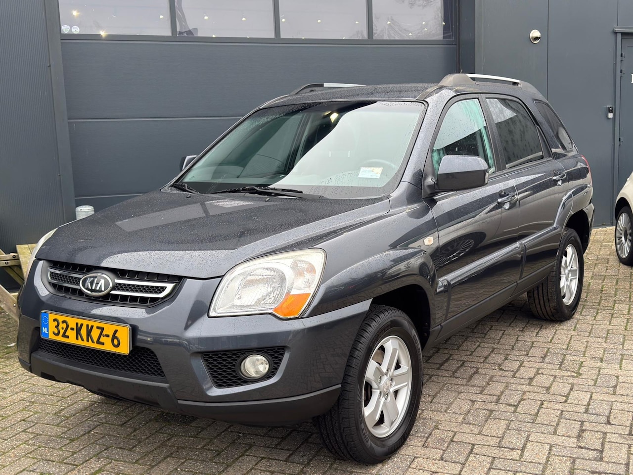 Kia Sportage - 2.0 CVVT X-ecutive 2.0 CVVT X-ecutive - AutoWereld.nl