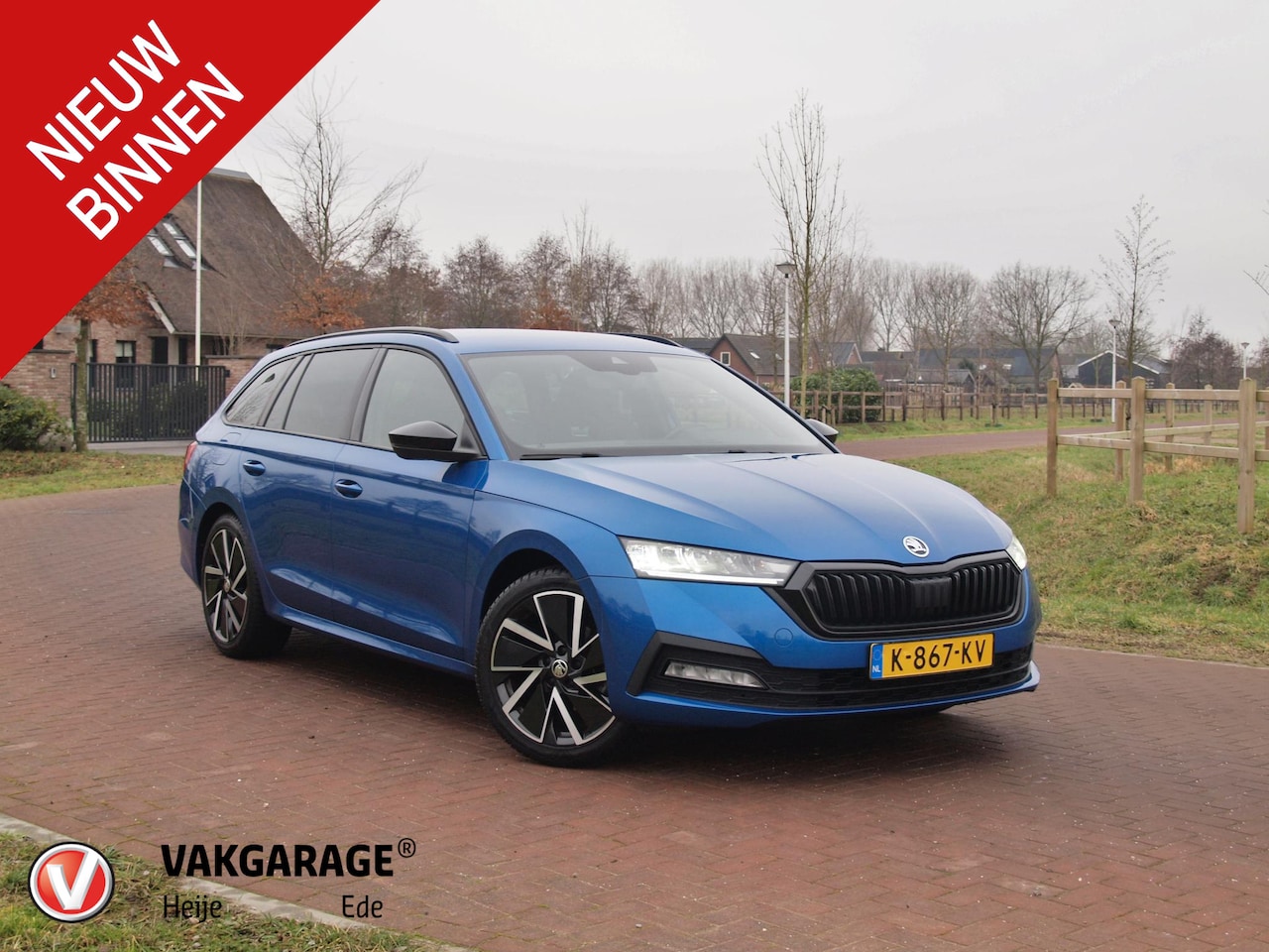 Skoda Octavia Combi - 1.0 TSI Sport Business | Sfeerverlichting | Apple Carplay | Trekhaak | Parkeersensoren | S - AutoWereld.nl