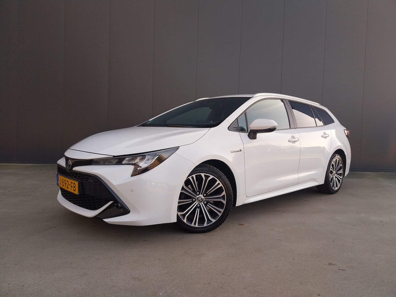Toyota Corolla Touring Sports - 2.0 Hybrid 1e EIGENAAR ADAPT CRUISE CAMERA LED NAVI ECC - AutoWereld.nl
