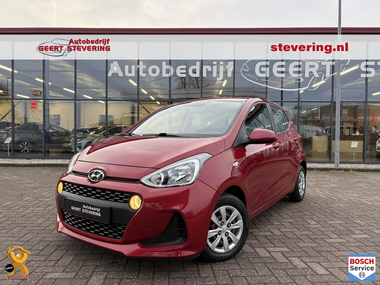 Hyundai i10 - 1.0i 66pk / Airco / Cruise / Lage km-stand - AutoWereld.nl