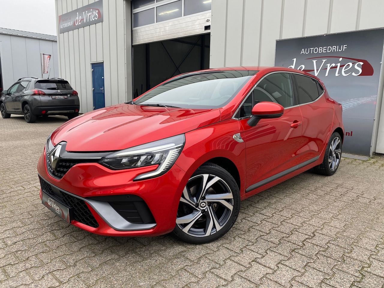 Renault Clio - 1.3 TCe R.S. Line 140PK / Clima / Cruise / Carplay / Navi / Half Leder / Keyless - AutoWereld.nl