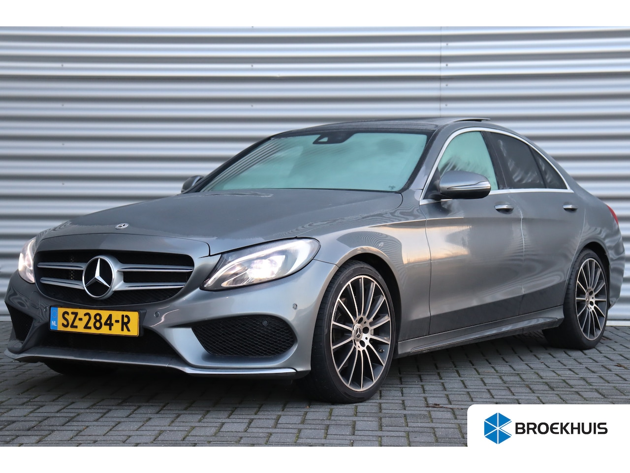 Mercedes-Benz C-klasse - C180 156PK AMG LINE PREMIUM PLUS UPGRADE AUTOMAAT / NAVI / LEDER / CLIMA / FULL-LED / PDC - AutoWereld.nl