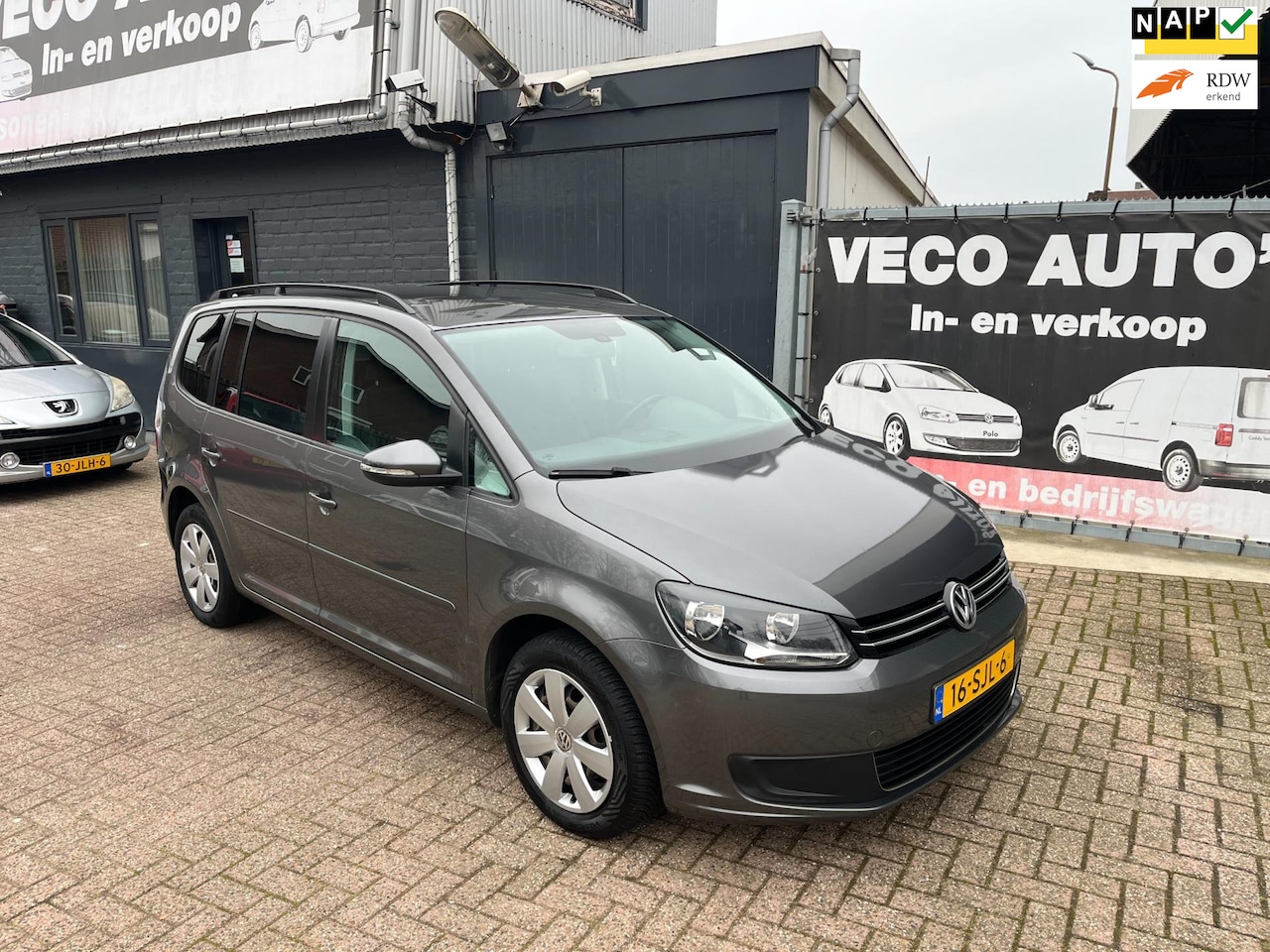 Volkswagen Touran - 1.2 TSI Comfortline BlueMotion 7p. navi pdc nette auto - AutoWereld.nl