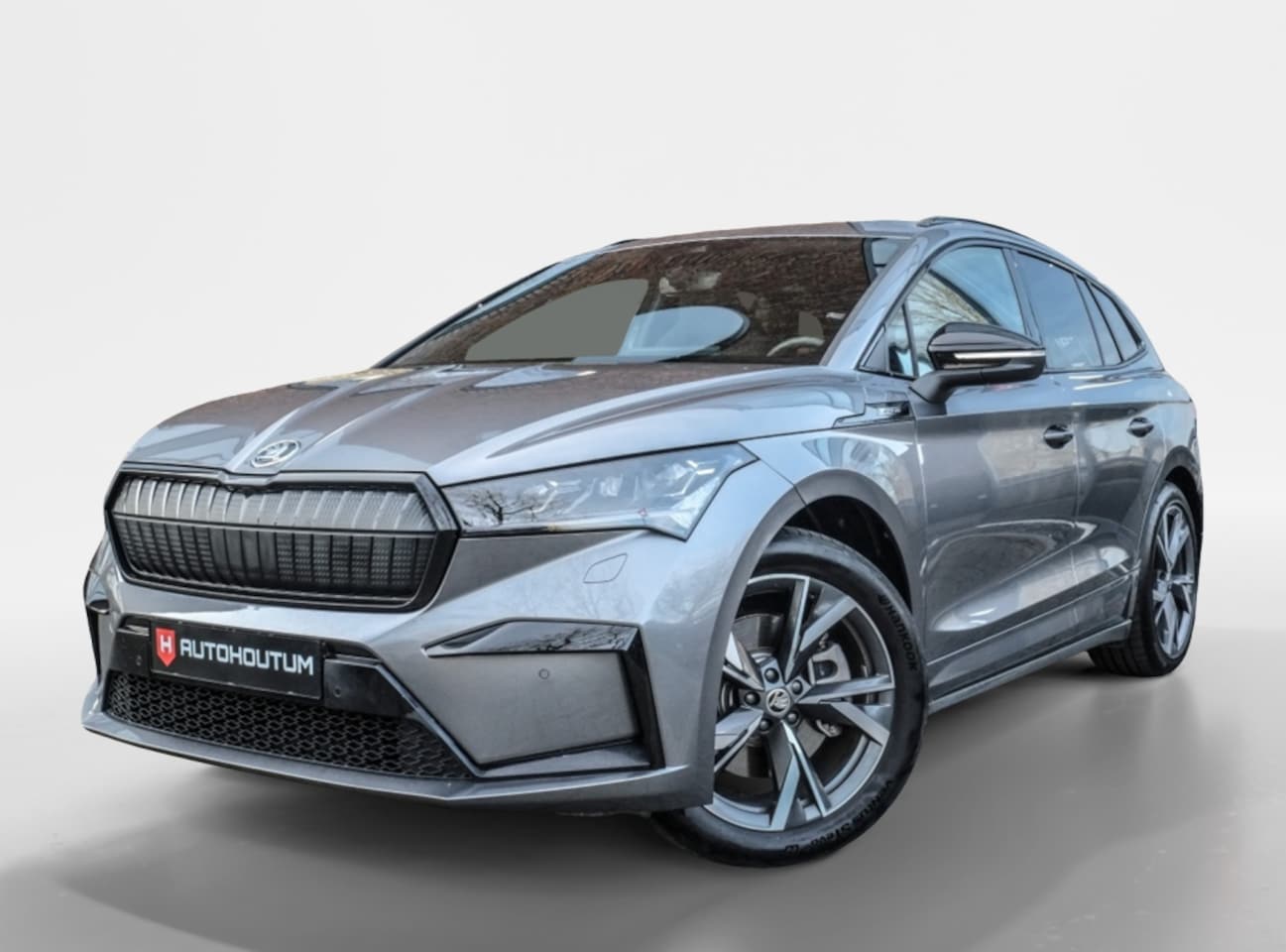 Skoda Enyaq iV - 85 Sportline Trekhaak, El stoelen, Camera - AutoWereld.nl