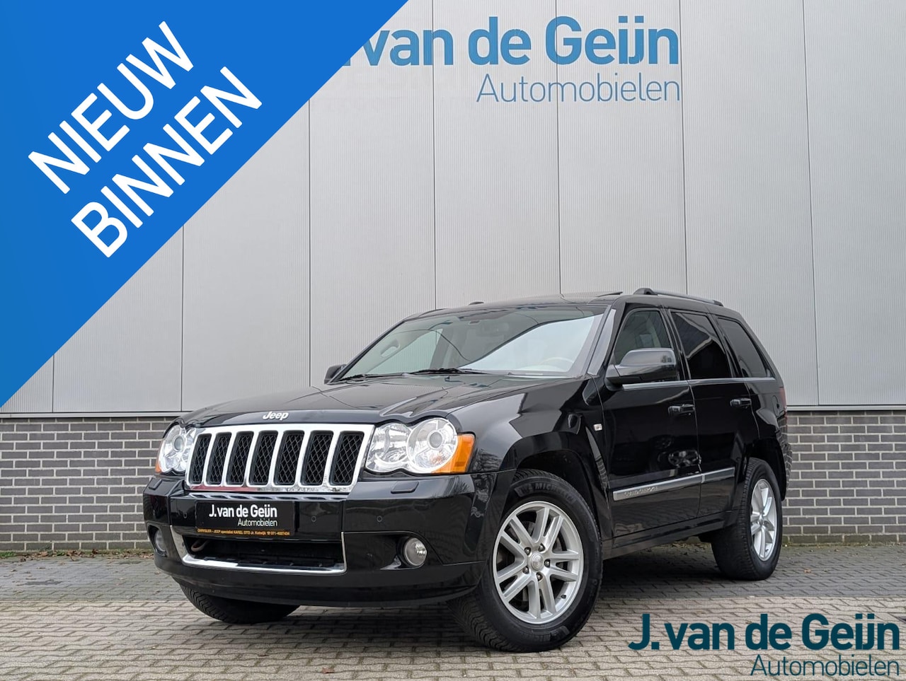 Jeep Grand Cherokee - 5.7 V8 Hemi Overland | Schuifdak | Camera | Leer | Trekhaak | Lage kmstand! - AutoWereld.nl