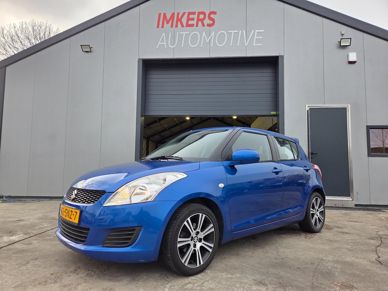 Suzuki Swift - 1.2 Comfort EASSS Airco | Stoelverw. | Trekhaak | USB - AutoWereld.nl