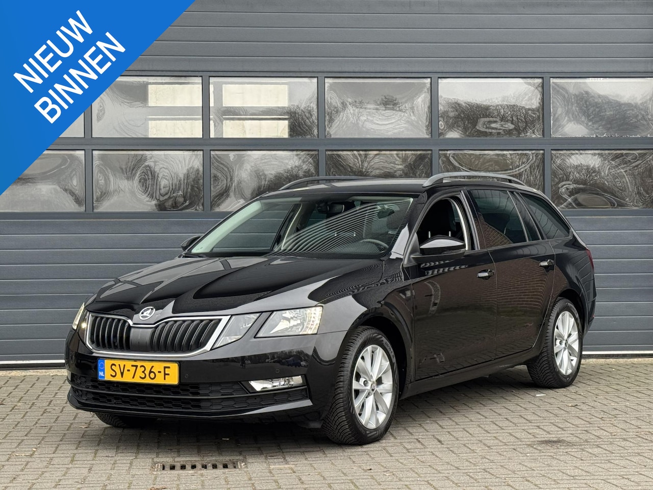 Skoda Octavia Combi - 1.5 TSI GREENTECH AMBITION BUSINESS I AUTOMAAT I TREKHAAK I APPLE CARPLAY I STOELVERWARMIN - AutoWereld.nl