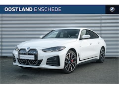 BMW i4 - eDrive35 M Sport / Schuif-kanteldak / Achteruitrijcamera / Comfort Access / Harman Kardon