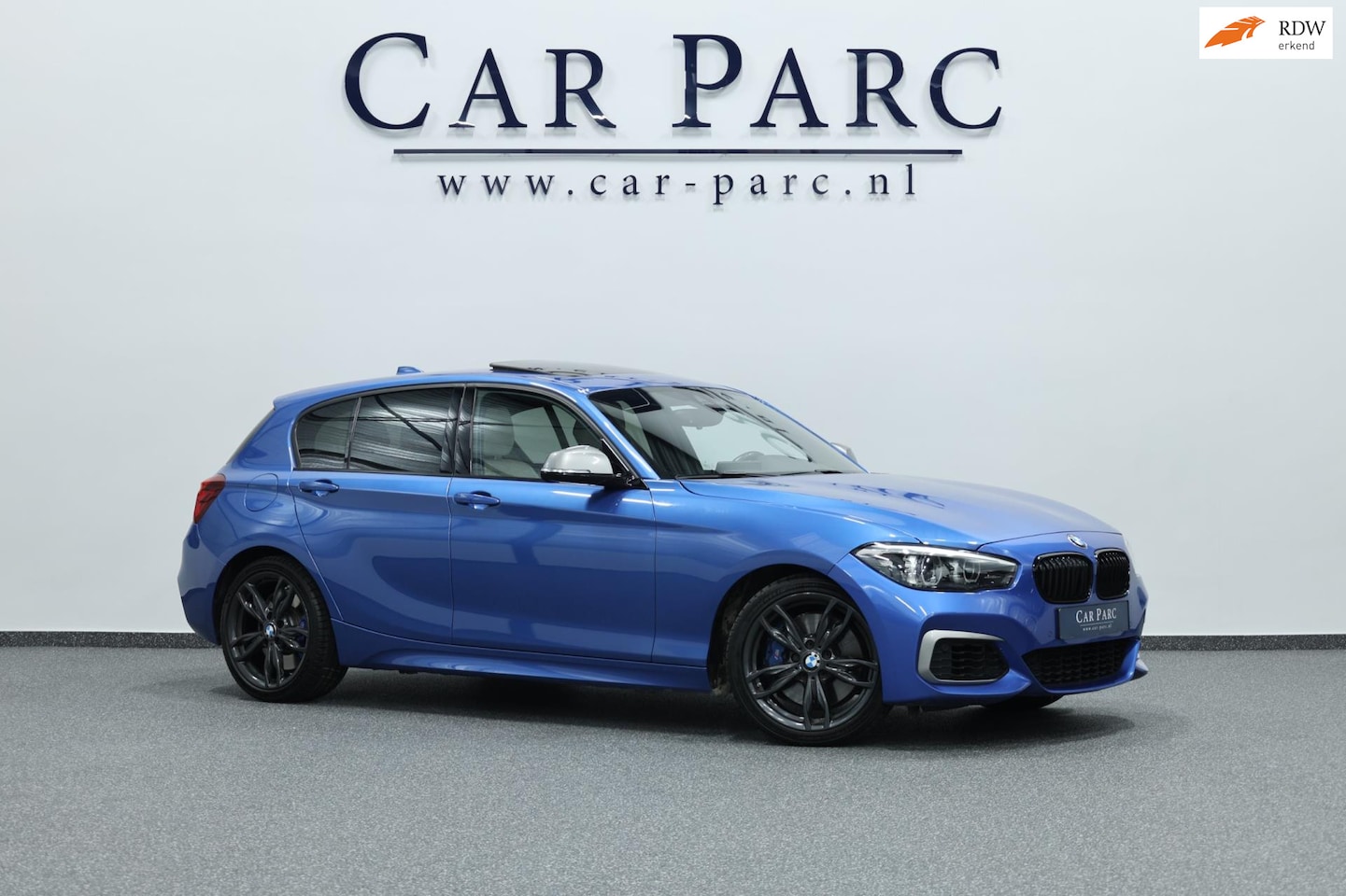 BMW 1-serie - M140i Special Edition LED/SCHUIFDAK/LEER+S.VERWARMING/LMV/PDC/CRUISE/ECC/12 MND GARANTIE! - AutoWereld.nl