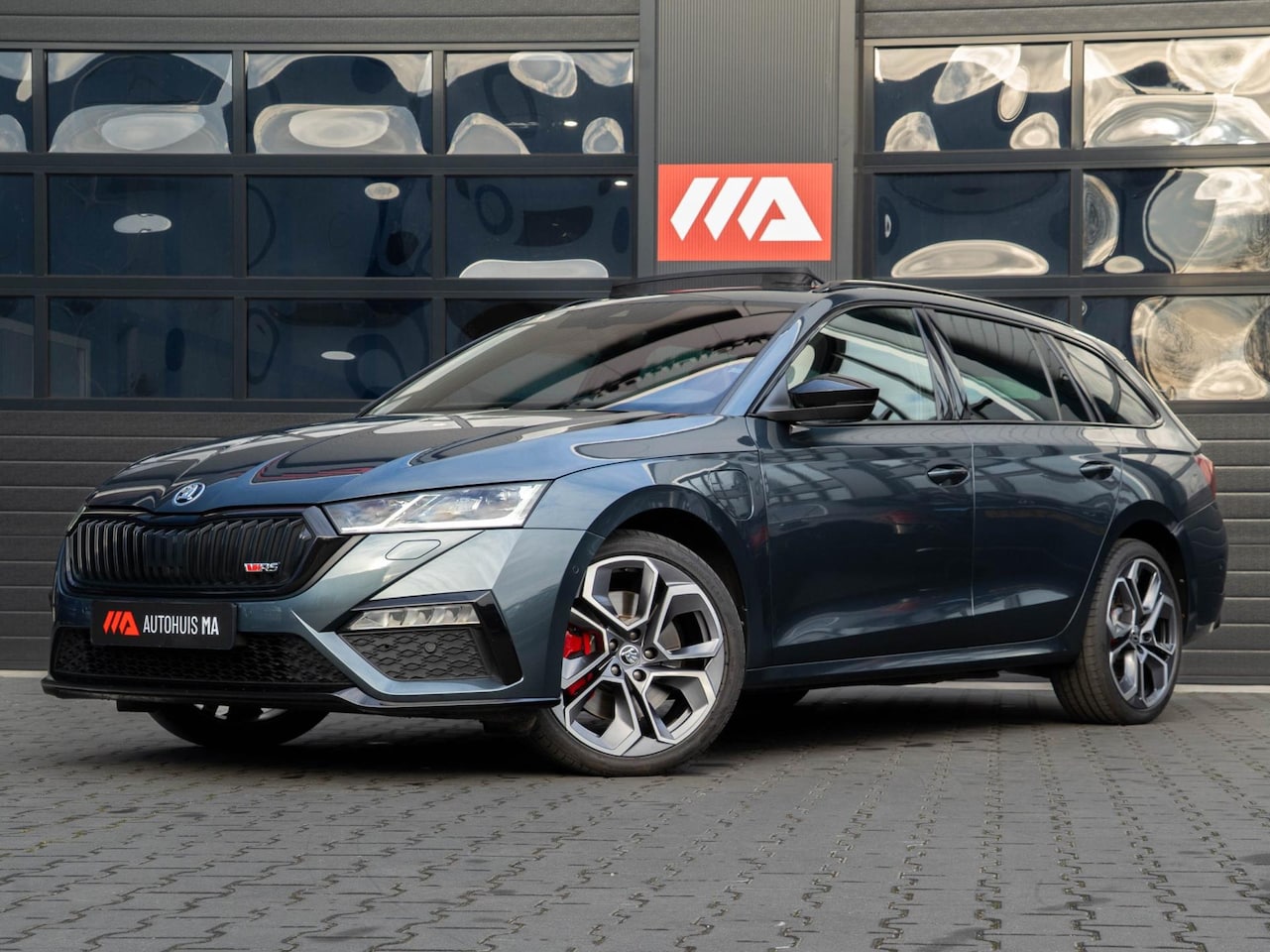 Skoda Octavia Combi - 1.4 TSI RS iV PHEV Business Headup/Stoelverwarming/Pano/CANTON - AutoWereld.nl