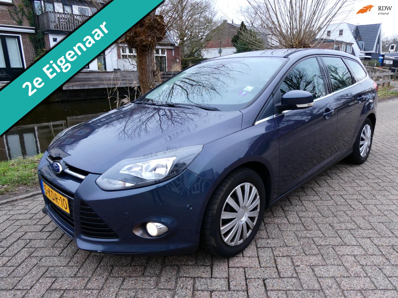 Ford Focus Wagon - 1.6 TDCI ECOnetic Titanium 105pk Clima Navi PDC - AutoWereld.nl
