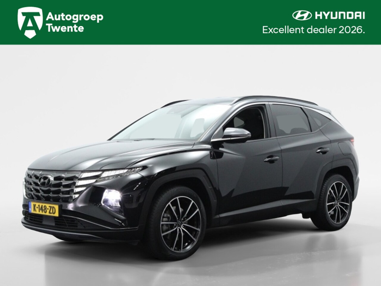Hyundai Tucson - 1.6 T-GDI HEV Comfort Smart | Navigatie | Camera | Stoelverwarmi - AutoWereld.nl