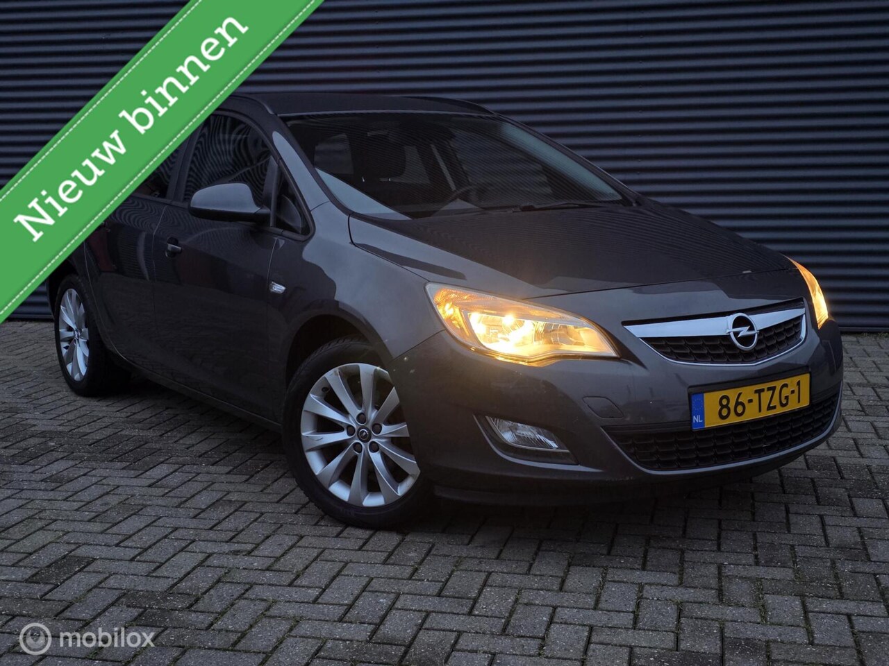 Opel Astra Sports Tourer - 1.4 Turbo Business 1.4 Turbo Business + - AutoWereld.nl