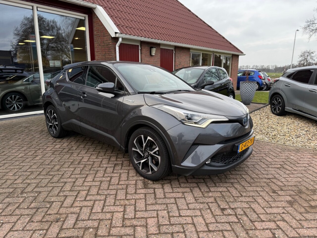 Toyota C-HR - 1.8 HYBRID STYLE ULTMATE AUTOMAAT SLECHTS 64.289 KM!! - AutoWereld.nl