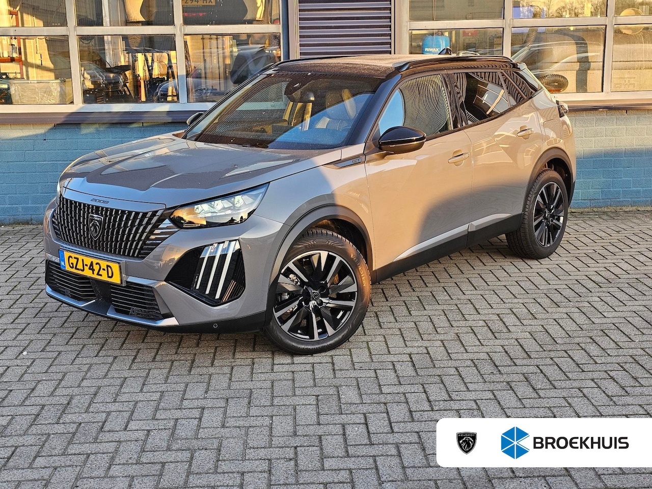 Peugeot 2008 - GT 1.2 Hybrid 136 PK Schuif/Kantel Dak | Apple Carplay/Android Auto | Keyless Entry & Star - AutoWereld.nl