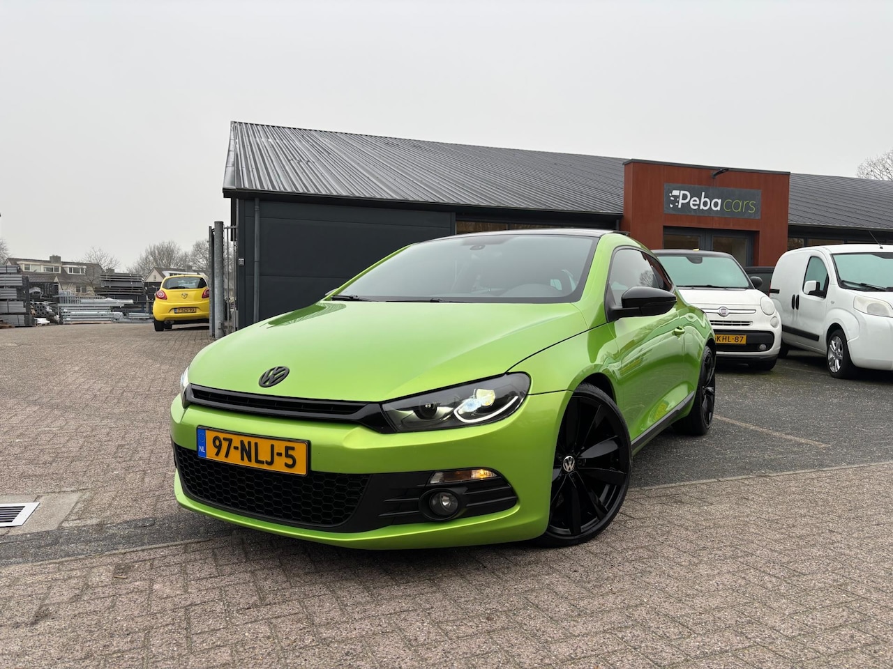 Volkswagen Scirocco - 1.4 TSI Highline Plus / Airco / Cruise control / 19 inch L.M Velgen - AutoWereld.nl