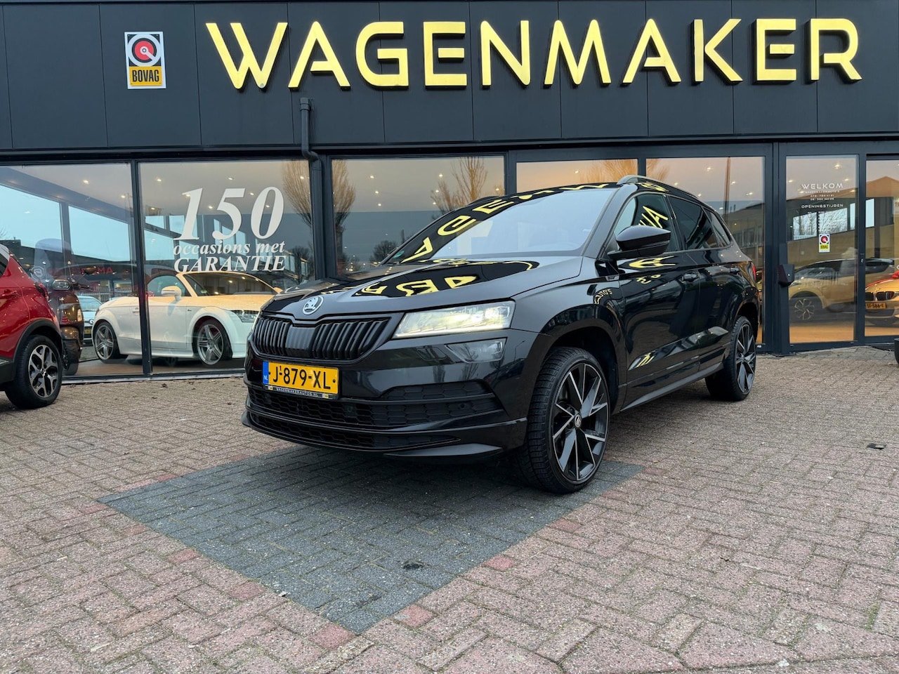 Skoda Karoq - 1.5 TSI ACT Sportline Business AUT|Navi|ACC|NAP - AutoWereld.nl
