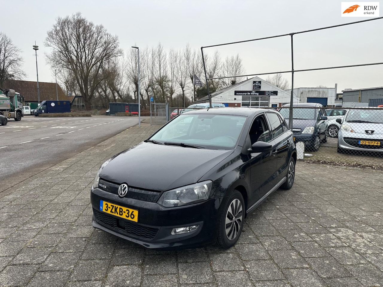 Volkswagen Polo - 1.4 TDI BlueMotion EU 6 Navi PDC - AutoWereld.nl