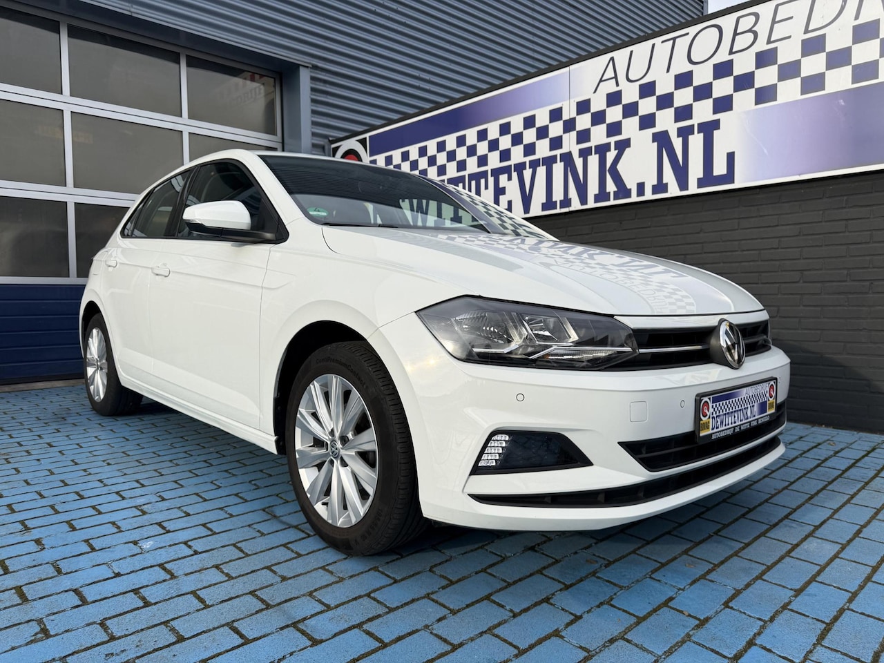 Volkswagen Polo - 1.0 MPI CRUISE STOELVERW. APPLE PDC V+A - AutoWereld.nl