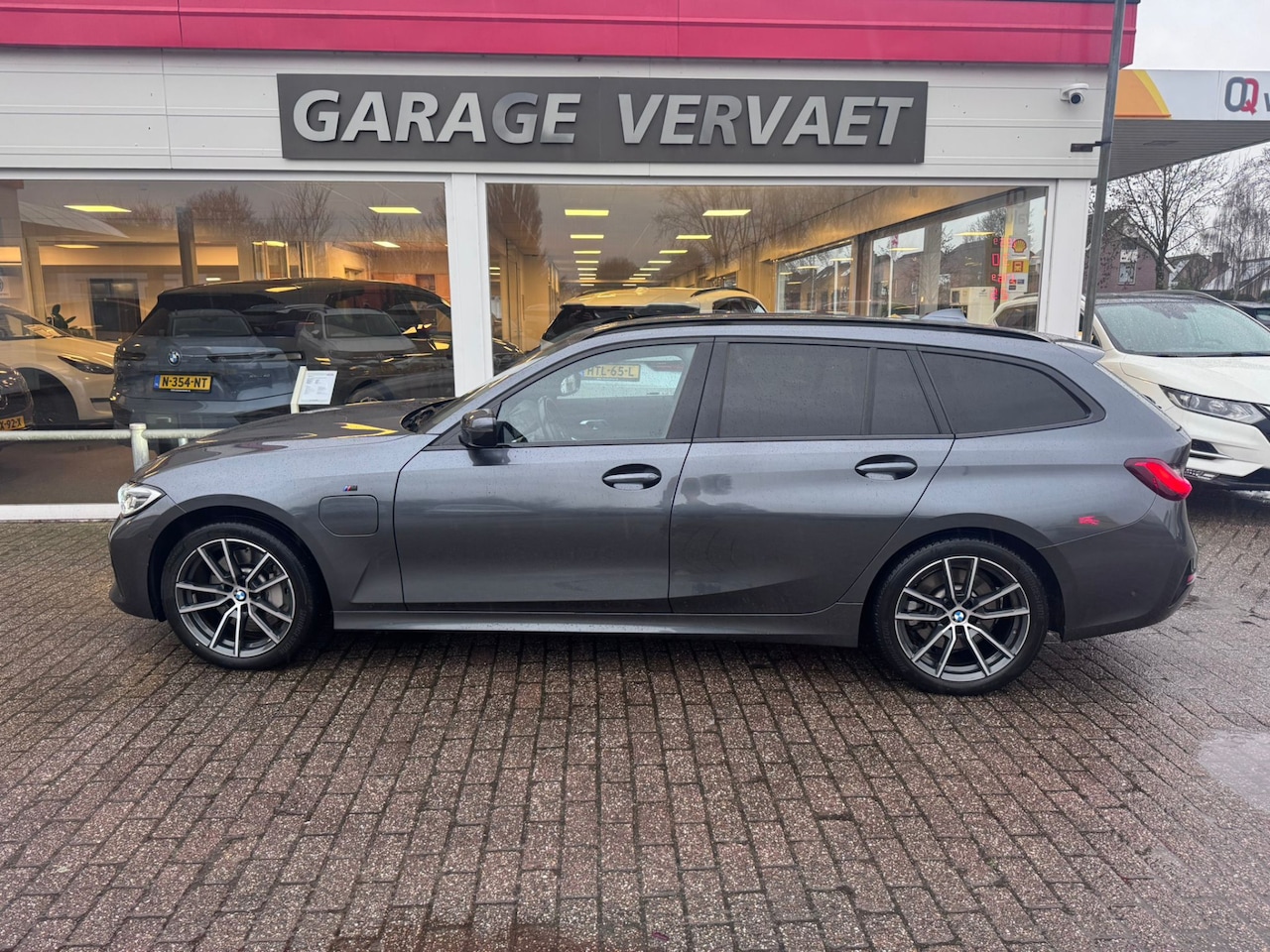 BMW 3-serie Touring - 330e High Executive M-Sport - AutoWereld.nl