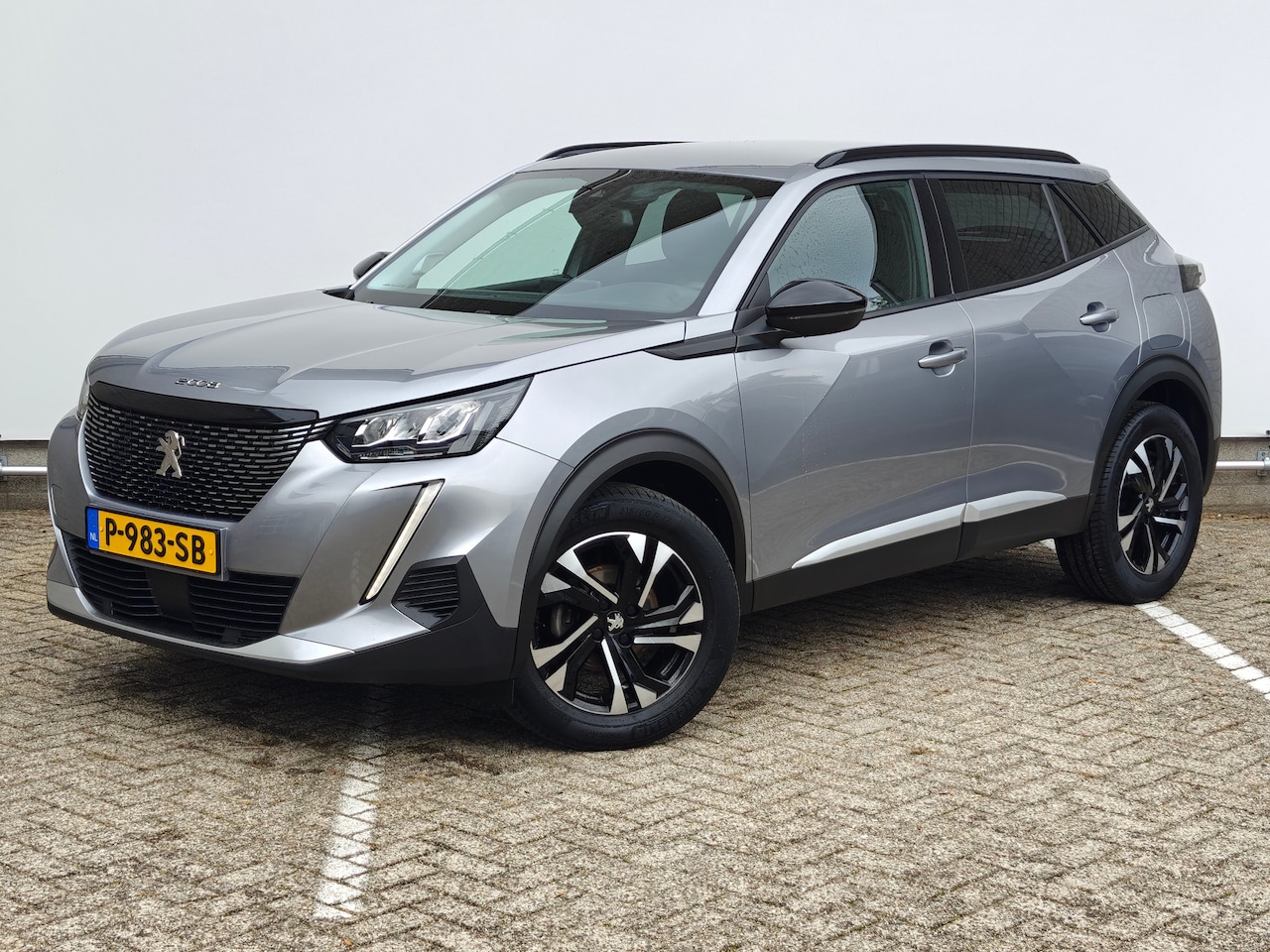Peugeot 2008 - 1.2 PureTech Allure Pack | Achterbank in delen neerklapbaar | Achteruitrijcamera | Airco ( - AutoWereld.nl