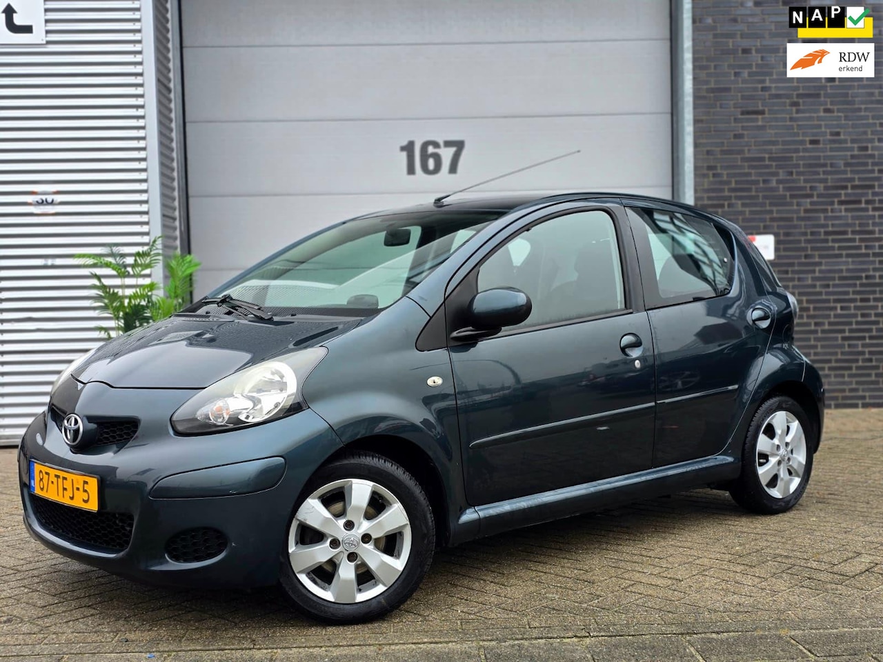 Toyota Aygo - 1.0-12V Aspiration Green Navigator|Navigatie|ABS - AutoWereld.nl