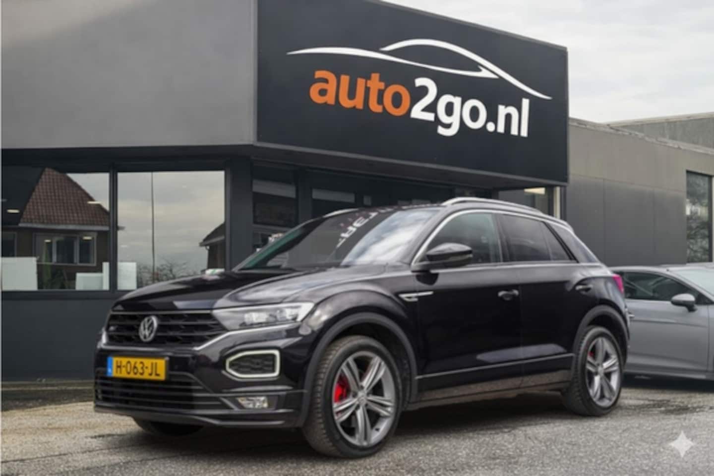 Volkswagen T-Roc - 1.5 TSI AUT7 R-LINE SPORT NAVI DIGIDASH APPLE.CARPLAY 18INCH.LMV PDC ORG.121d.KM!!! - AutoWereld.nl