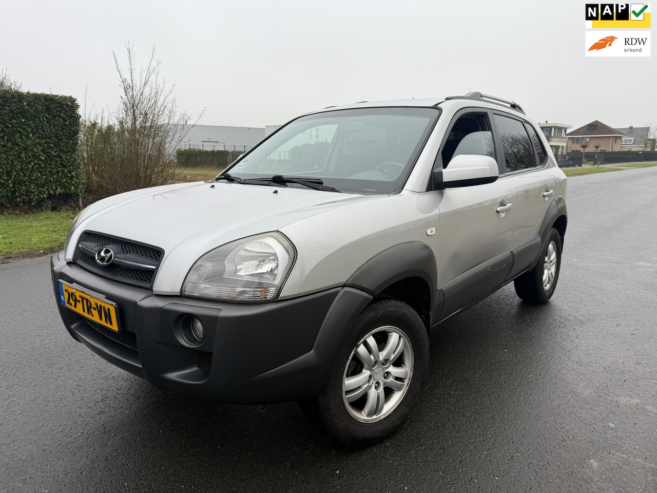 Hyundai Tucson - 2.0i Dynamic Sense NAP/APK 2-2027 - AutoWereld.nl