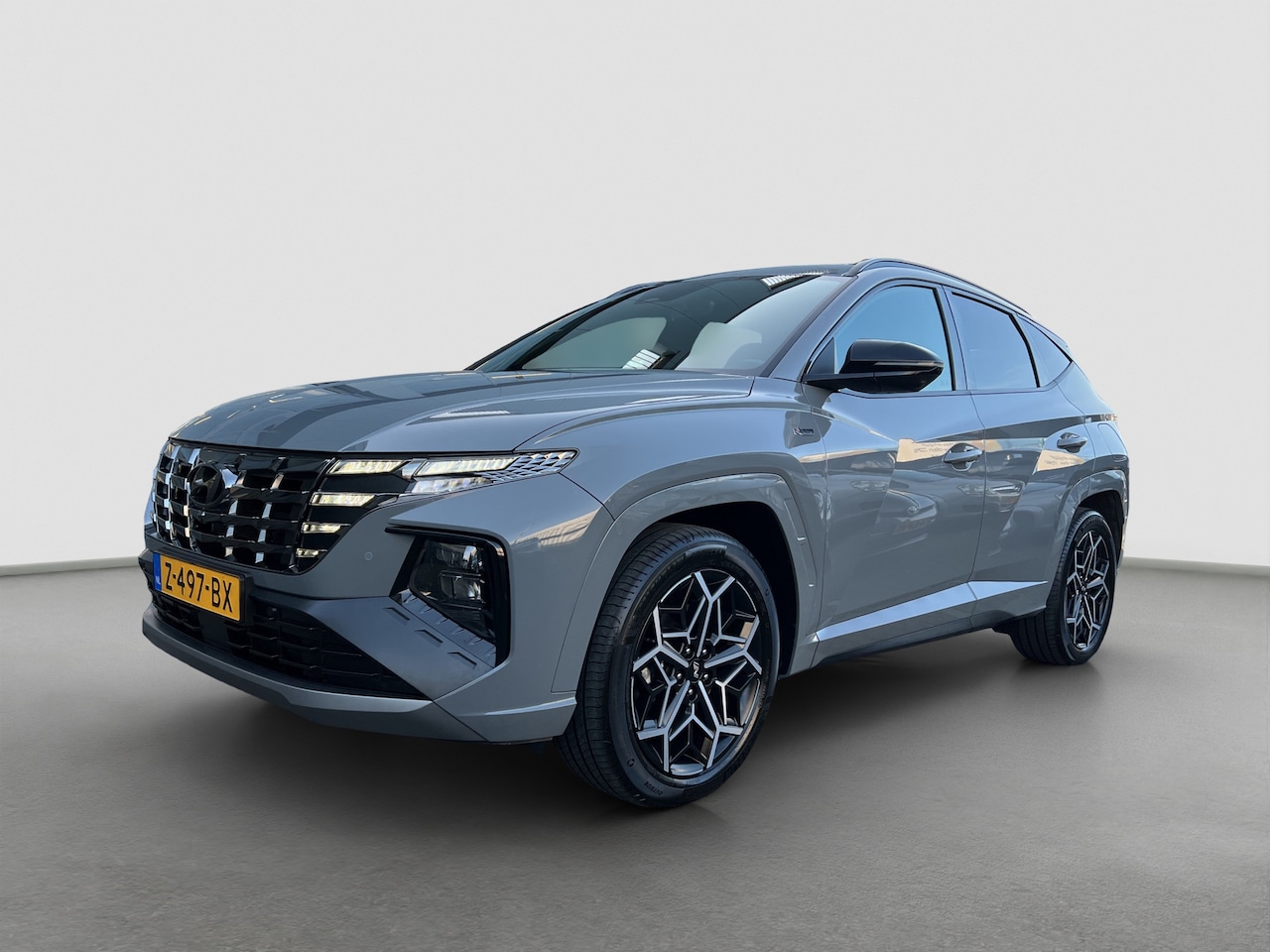 Hyundai Tucson - 1.6 T-GDI PHEV 265pk N-Line 4WD | Leder | Climate | Keyless | Navigatie | Elek. Klep | Ful - AutoWereld.nl