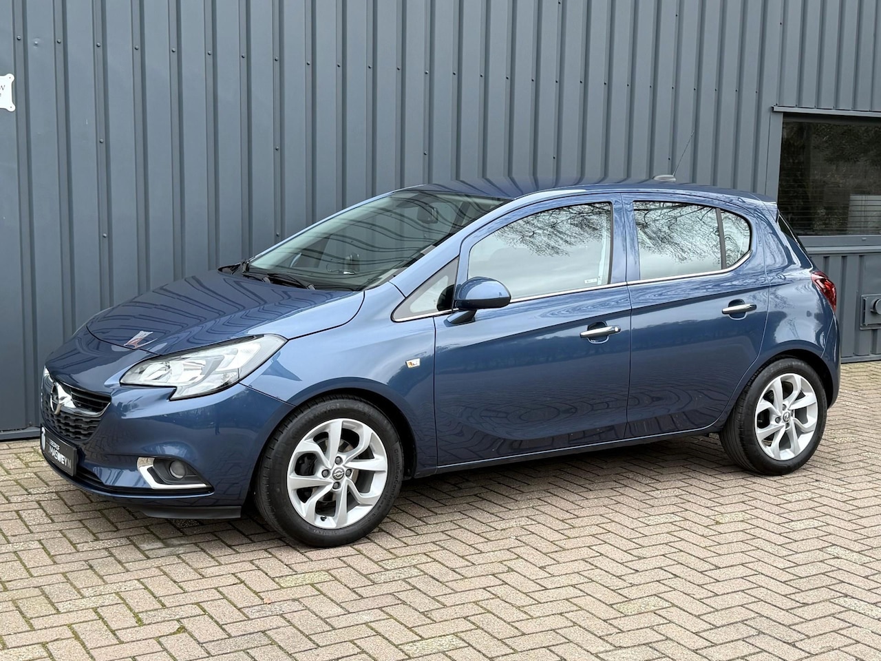Opel Corsa - 1.2-16V Cosmo NAVIGATIE!/APK!/ONDERHOUDEN!/CRUISE!/ - AutoWereld.nl